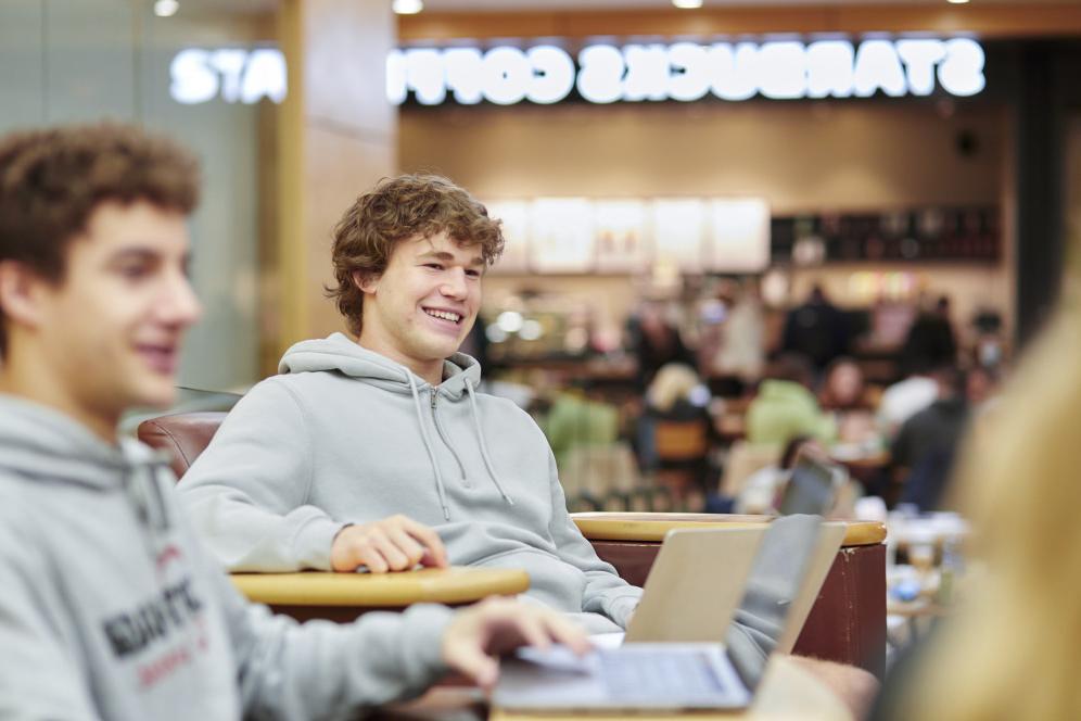 Students hang out in Starbucks between classes.
